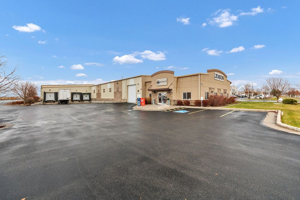 Exterior of the Jenson Indoor Storage facility with loading bays in Logan, Utah